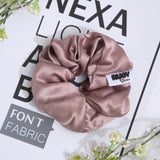 ربطة شعر حريرية وردية فاخرة